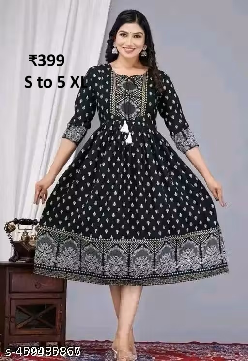 Black butiy Name: Black butiy Fabric: Rayon Sleeve Length: Three-Quarter Sleeves Pattern: Printed